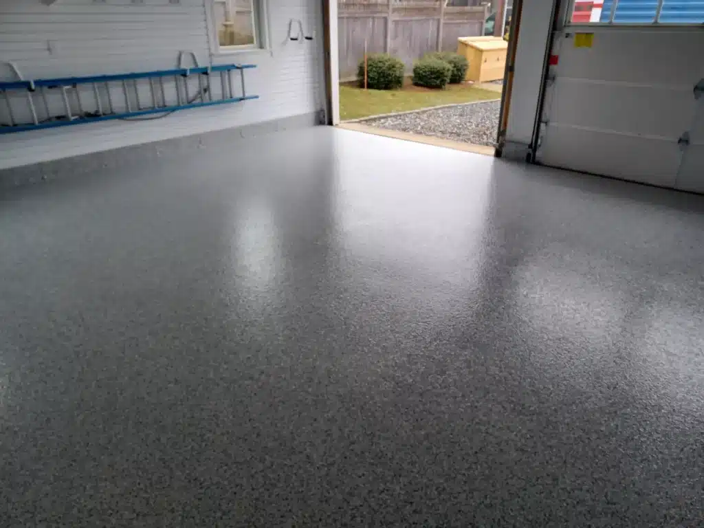 Garage floor epoxy coating for protecting against winter weather