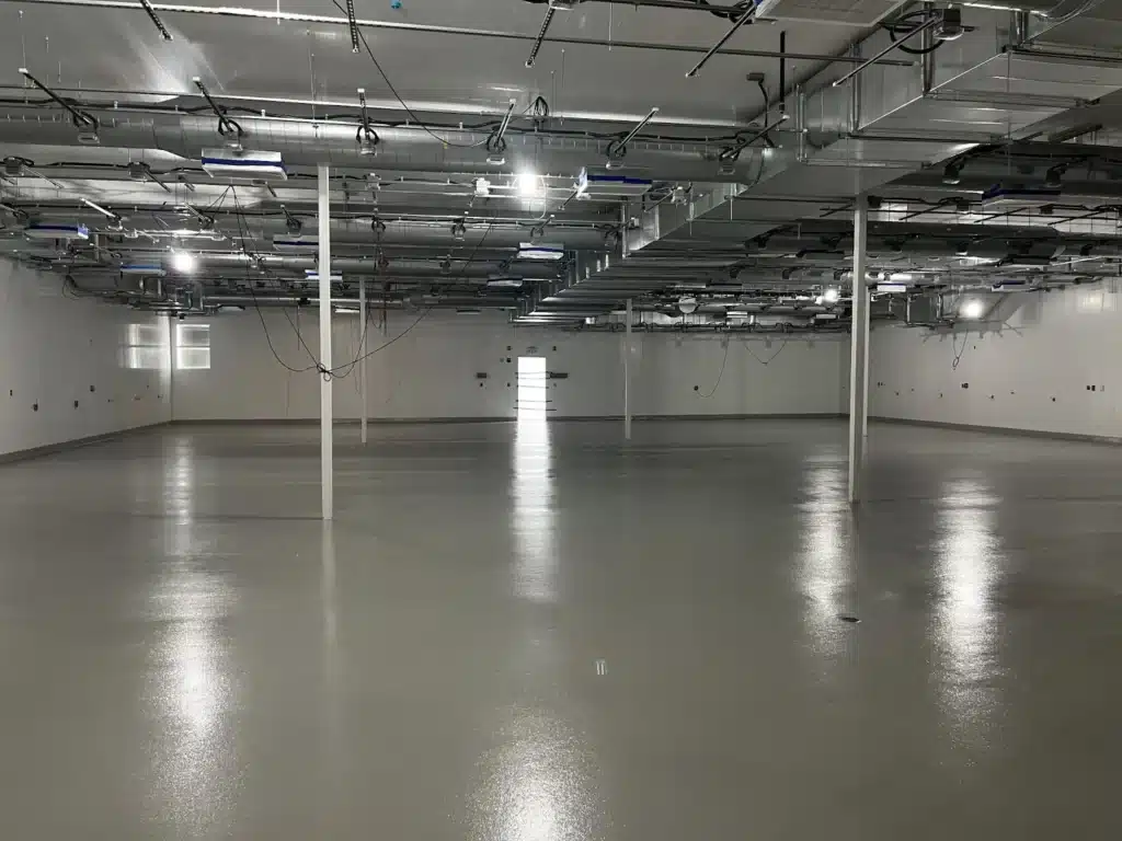 Solid color epoxy floor by Topcoat Services provides versatility and durability.