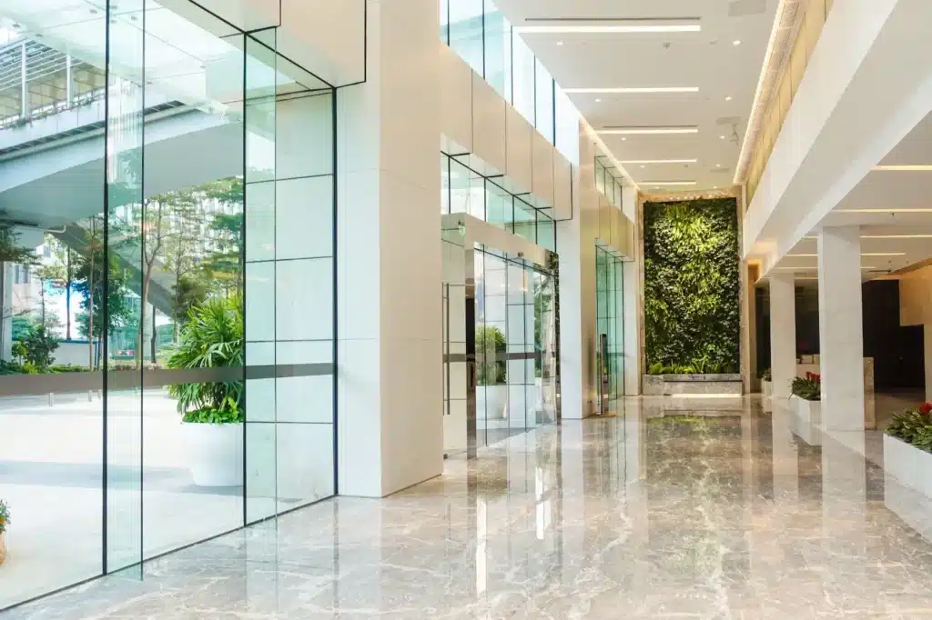 A highrise building lobby shines with metallic epoxy flooring from TopCoat Services.