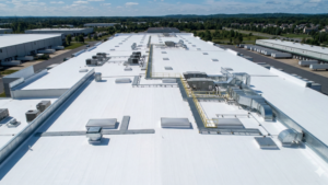 commercial roof coating vs replacement