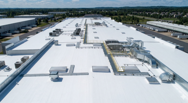 Roof Coating vs. Replacement for Commercial Buildings in 2027 1 commercial roof coating vs replacement