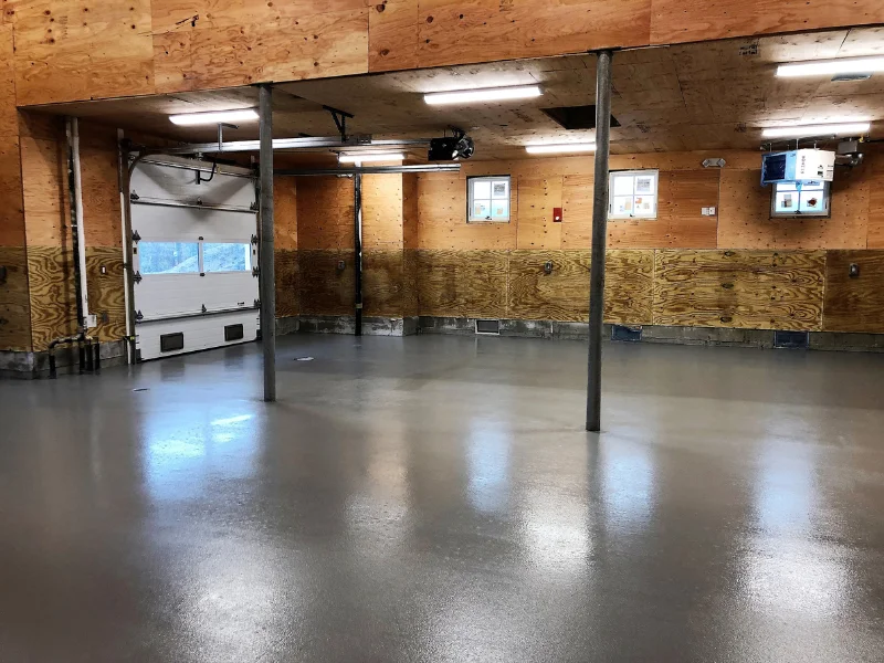 Gray epoxy floor in a municipal boat storage building, Harwich, MA