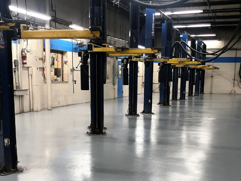 Glossy gray epoxy floor in the Hyannis Honda service area, Hyannis, MA