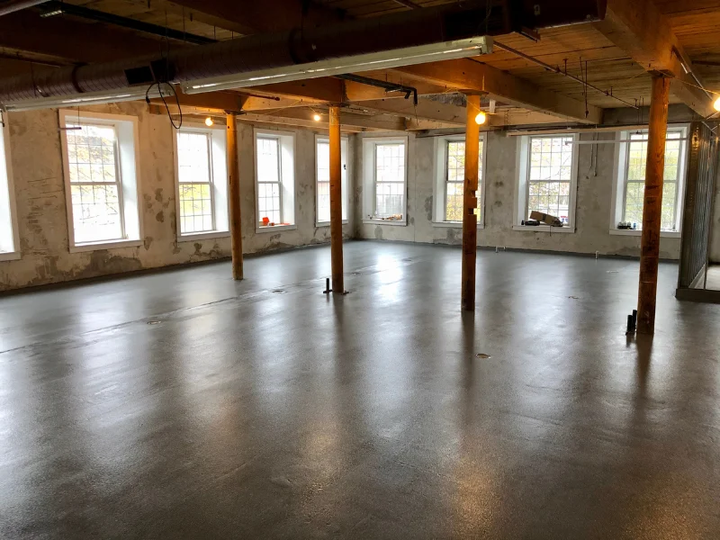 Glossy gray epoxy floor in the Glen Pharma distillery, Franklin, MA