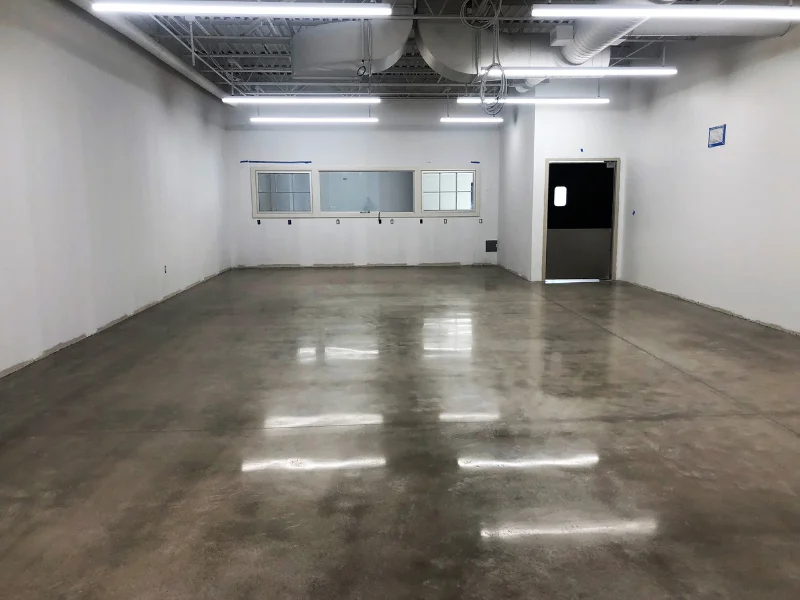 Glossy gray epoxy floor in the Sherwin-Williams warehouse, Dorchester, MA