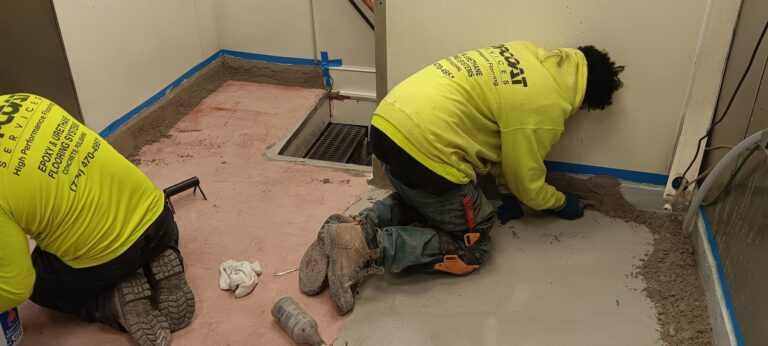 Cove base being installed over the membrane along a kitchen wall, Brazilian Grill, Hyannis, MA