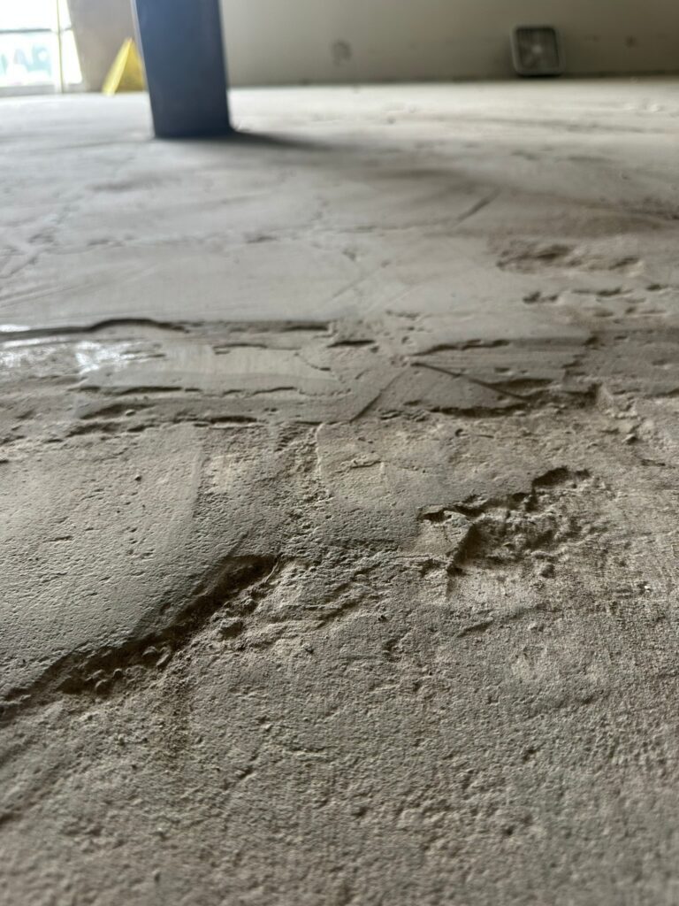 Burlington, Walpole, MA: slab surface during removal of existing layers