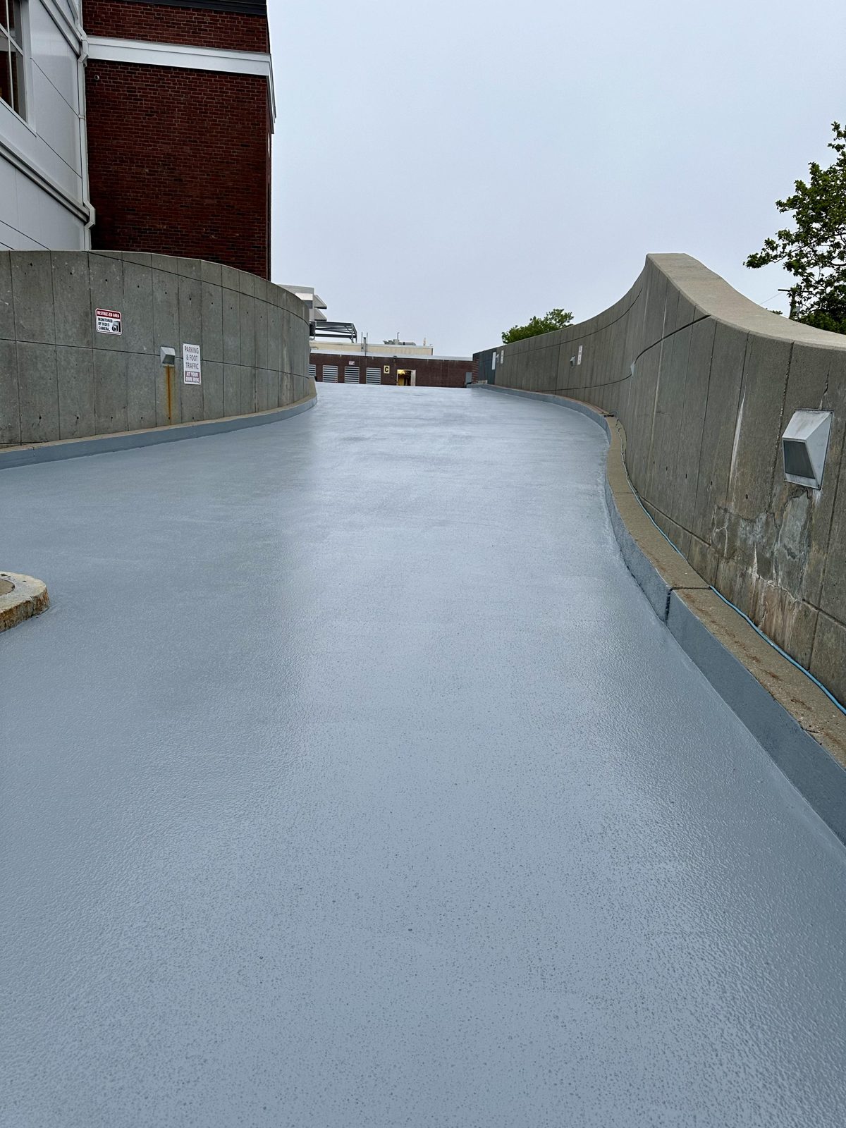 Cape Cod Hospital Parking Deck Case Study 9 Finished gray ramp surface on the Cape Cod Hospital parking deck