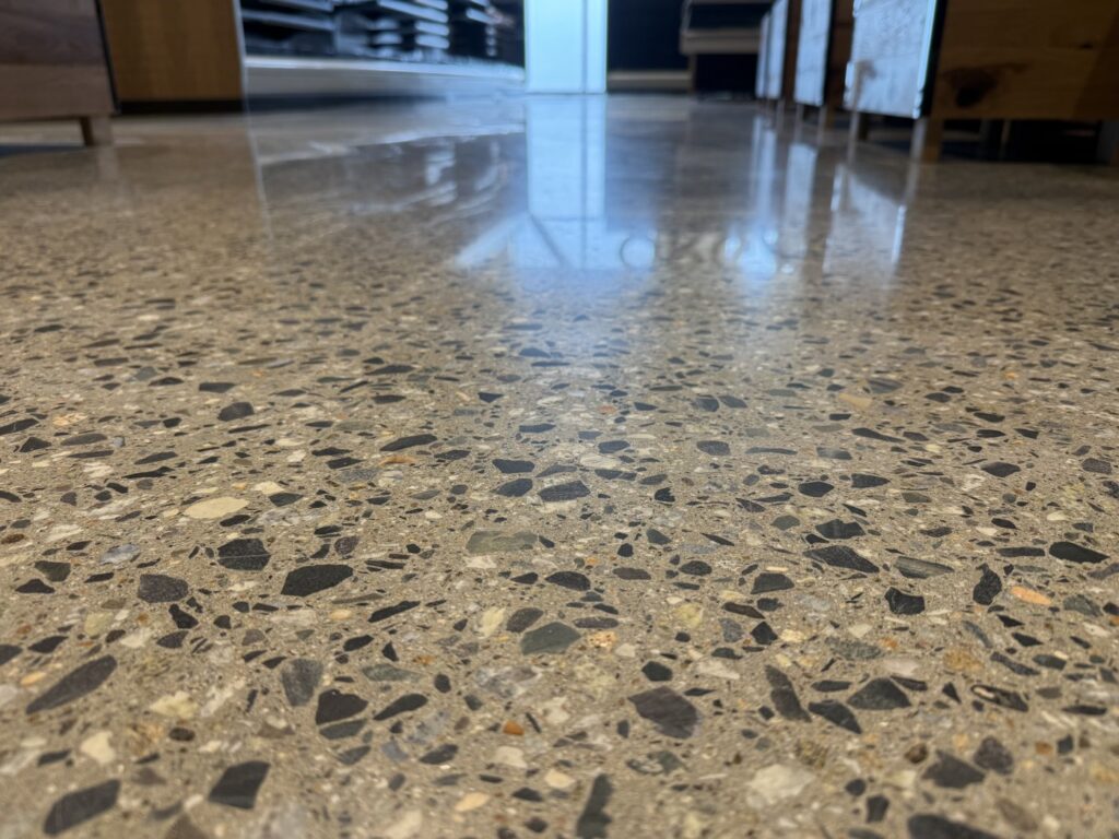 Full exposure polished concrete floor with large exposed aggregate