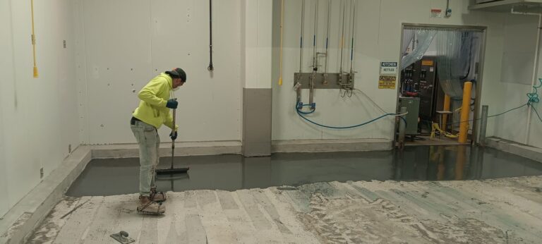 Crew placing the Poly-Crete MD urethane cement basecoat, Joseph’s Gourmet Pasta, Haverhill, MA