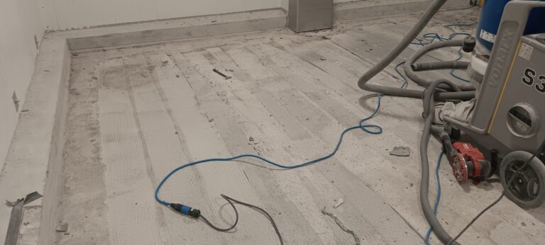 Prepared slab along the room perimeter and curb before the basecoat, Joseph’s Gourmet Pasta, Haverhill, MA