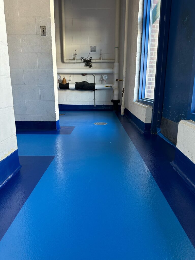 Corridor with a two-tone blue floor and dark blue cove base, Rocky Neck, Boston Fish Pier