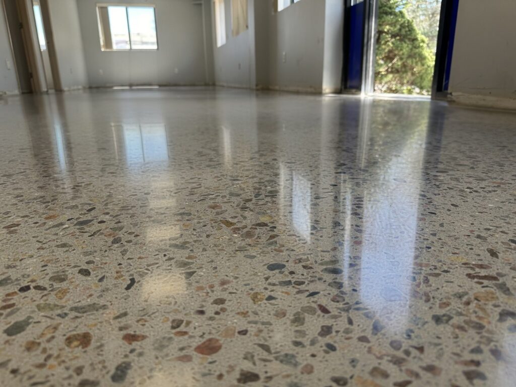 Gloss sheen polished concrete floor with clear but soft reflections