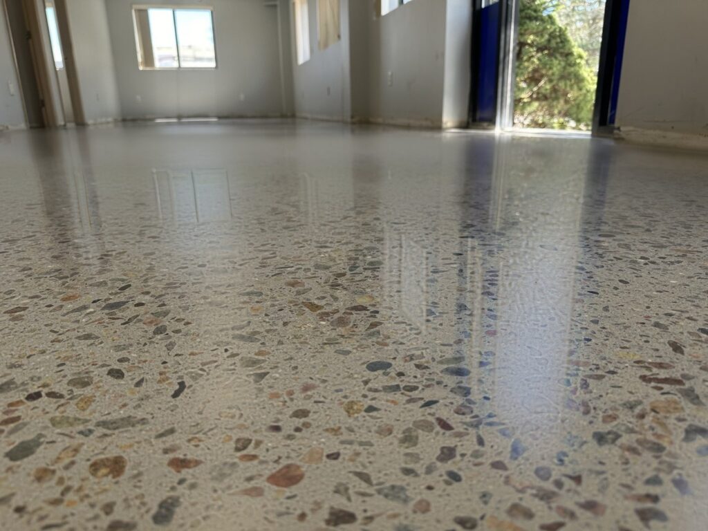 Satin sheen polished concrete floor with soft, diffuse reflections