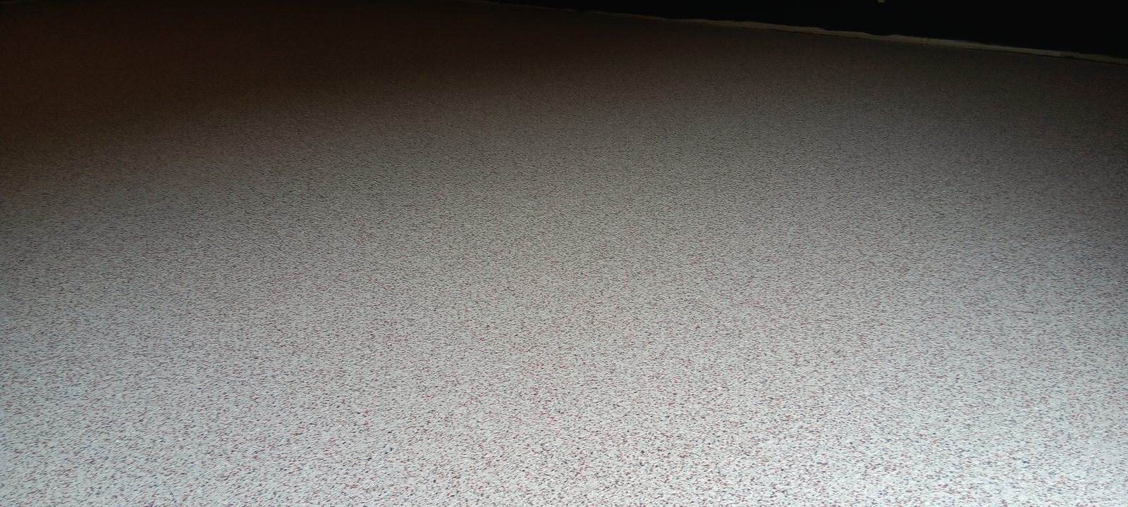 Commercial & Industrial Flooring in Westford 4 Close-up of the finished floor surface texture, Telsonic, Westford, MA